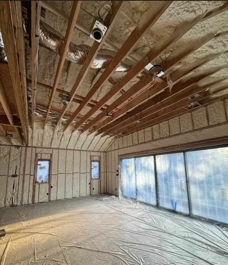 Interior walls and ceiling insulated with spray foam during new construction in San Bernardino